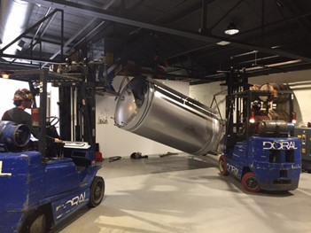 Doral lifts installing tanks inside at Good City Brewing